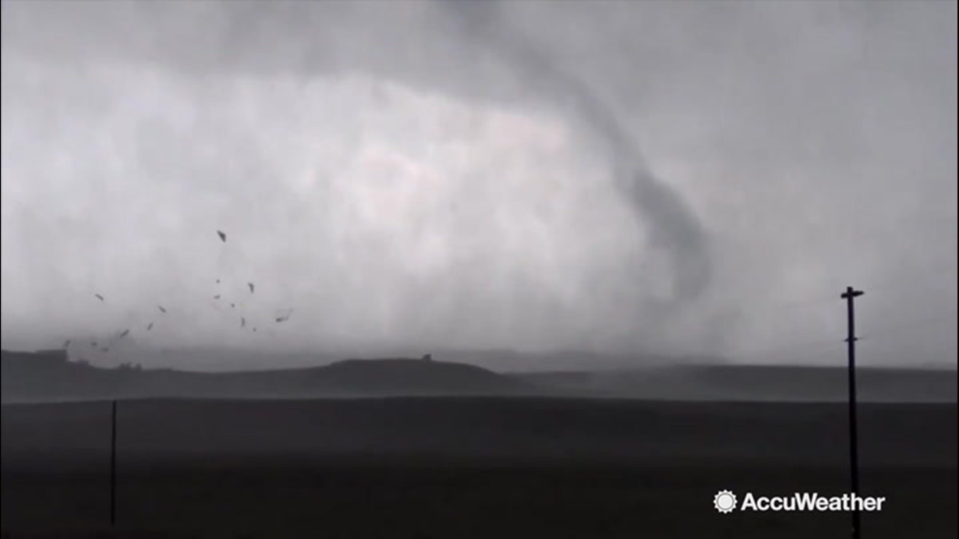 Reed Timmer is near Fort Laramie, Wyoming, on Sept. 10, filming dangerously close to a tornado. Included in his footage is the terrible destruction of a structure as the massive wedge tornado tears through it.