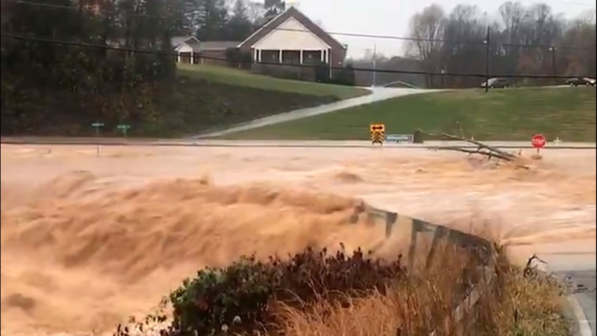 Rushing floodwaters overwhelmed washed-out road | 9news.com