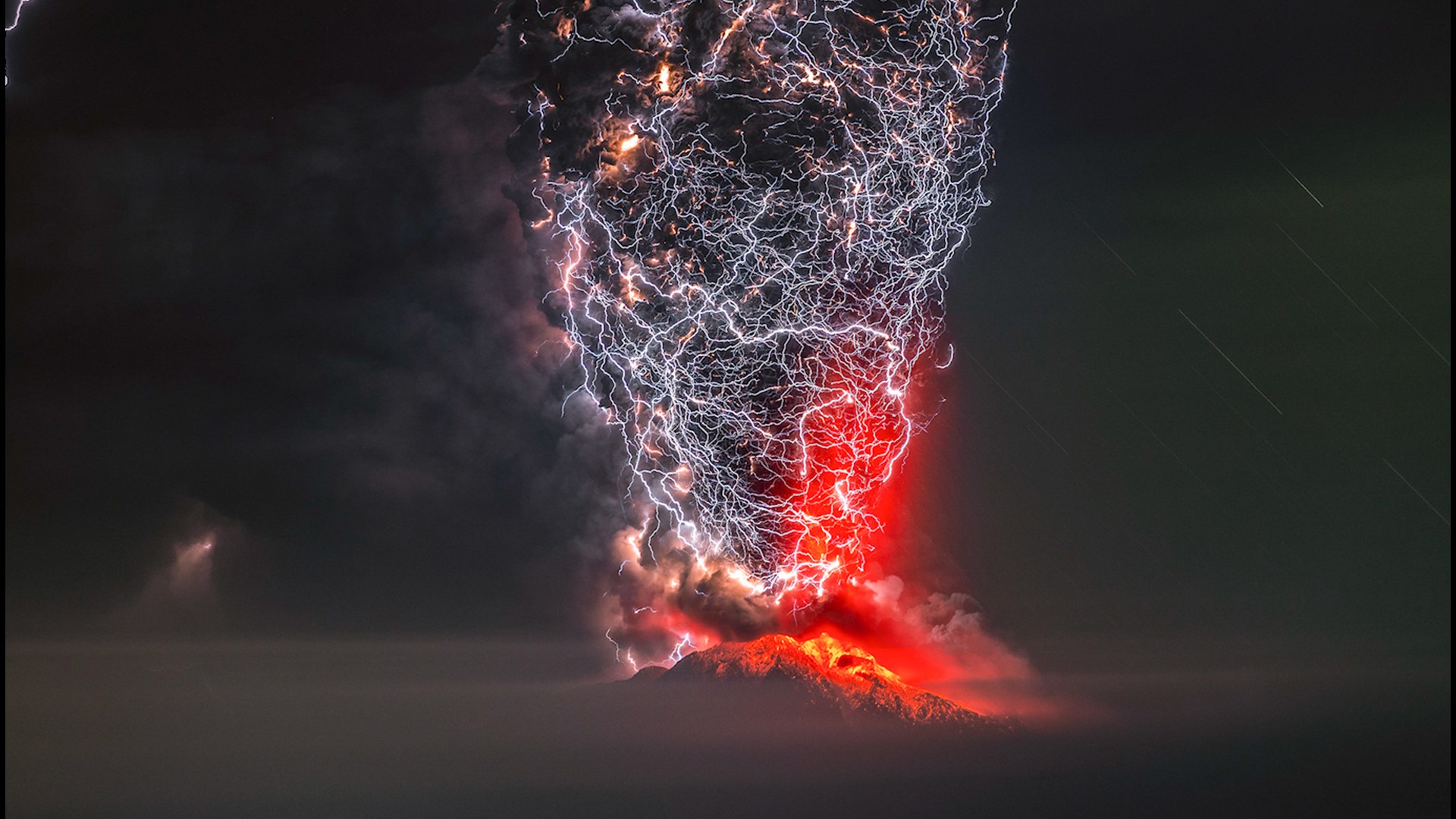 The incredible shot of the rare phenomenon, captured above Calbuco volcano in southern Chile, won first prize in 'The Perfect Moment' photo competition.