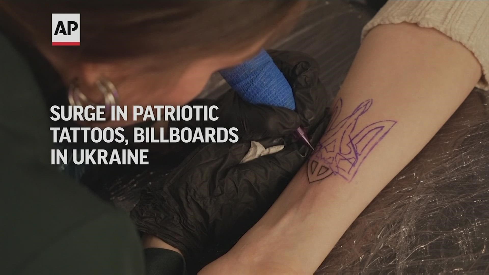 As the war in Ukraine enters its fourth week, patriotic messages are appearing on bodies and billboards.
