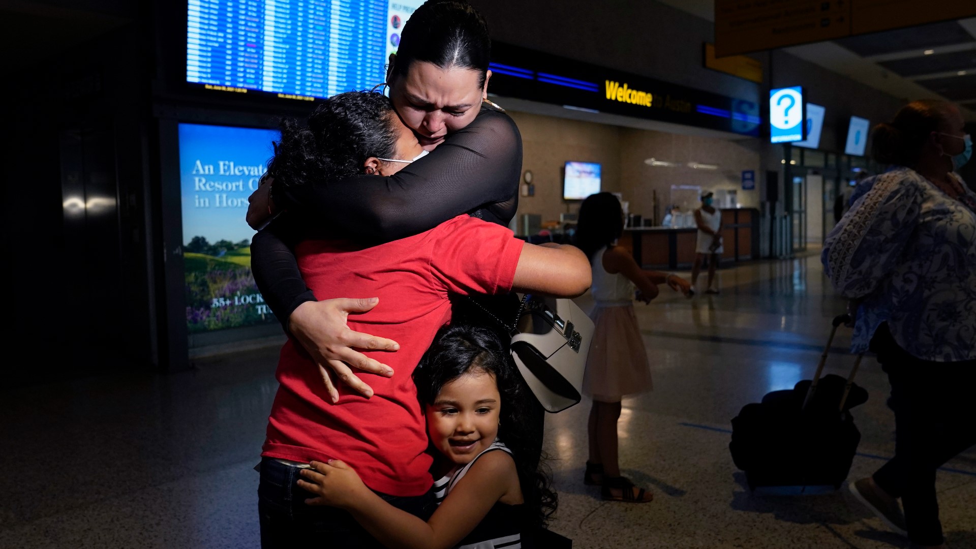 A mother living in America reunited with her daughter on Sunday after seeing a photo of the little girl in a story about children crossing the border alone.