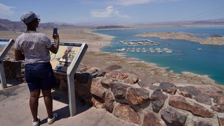 Overuse Fish Lake Mead hits historic low water level as Colorado River struggles ...