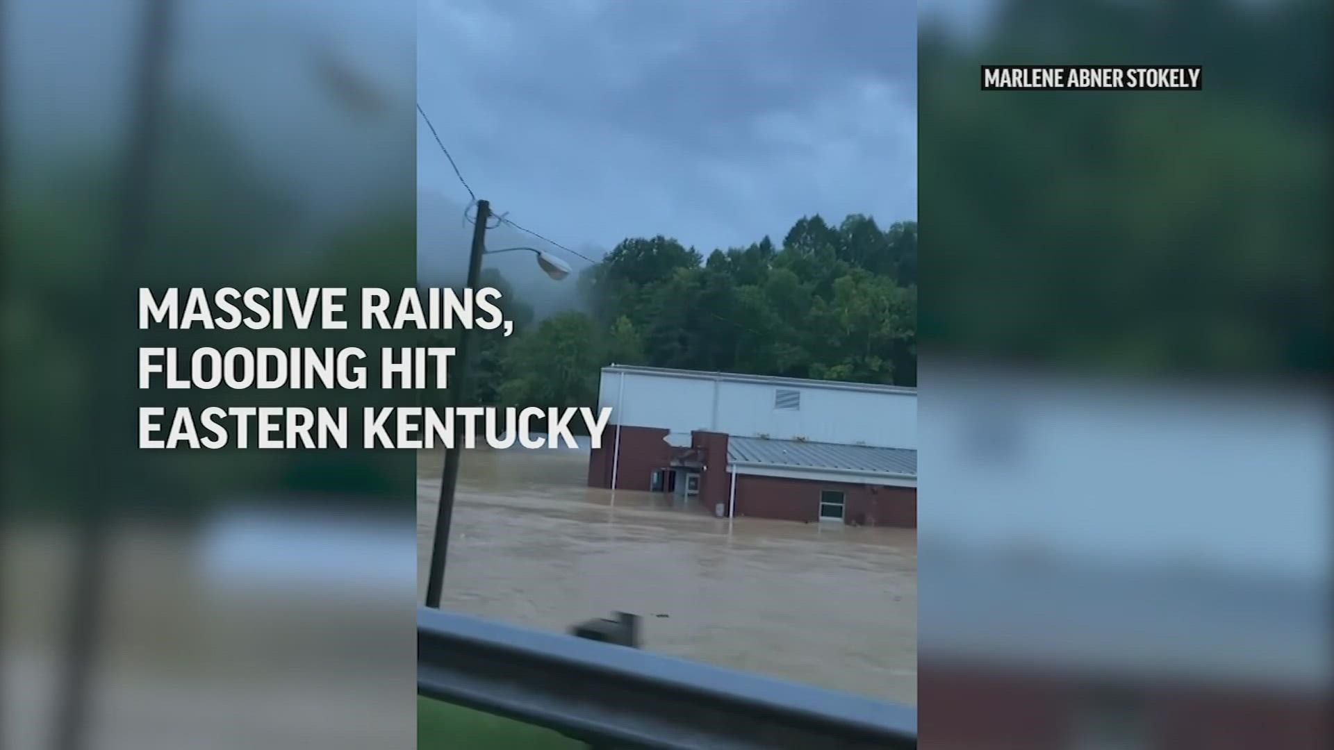 Trapped homeowners swam to safety and others were rescued by boat as record flash flooding killed at least 16 people in eastern Kentucky.