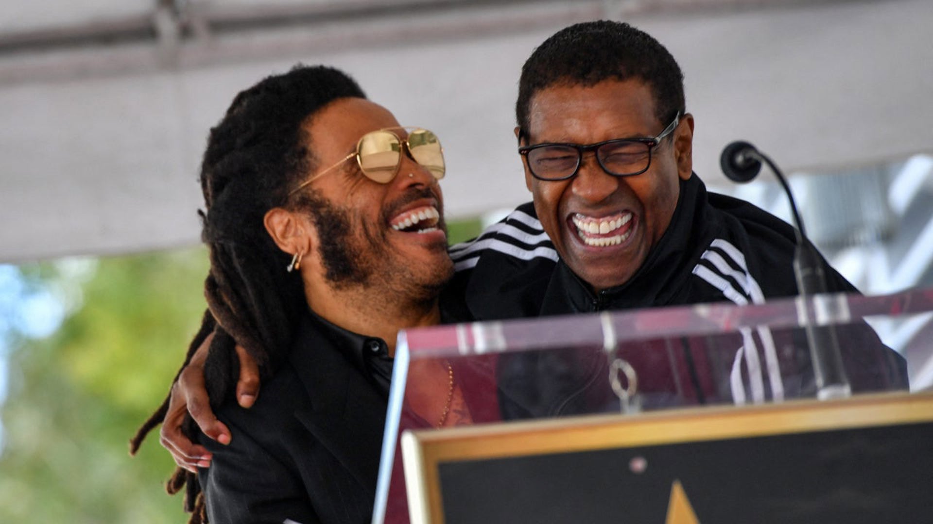 Lenny Kravitz Stops Concert to Answer FaceTime Call From 'Brother' Denzel Washington | 9news.com