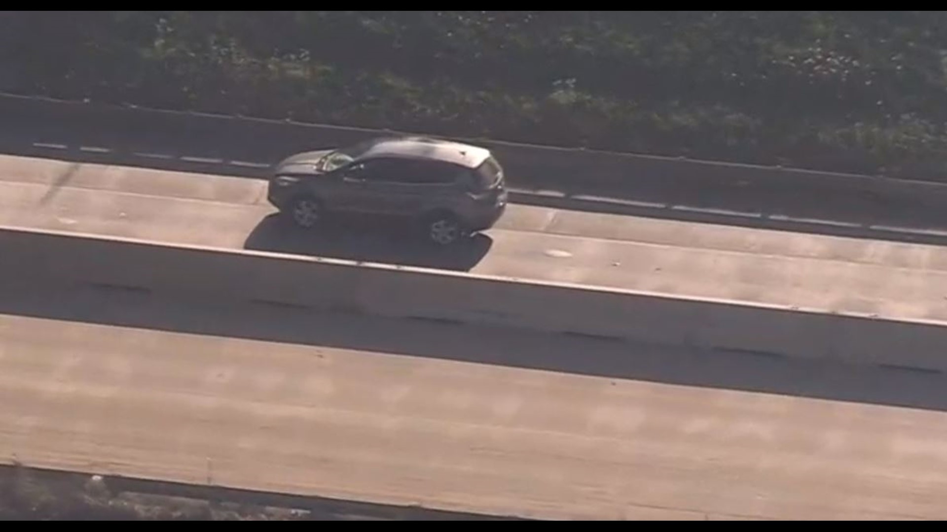 Assault suspect leads police on bizarre slow-speed chase | 9news.com