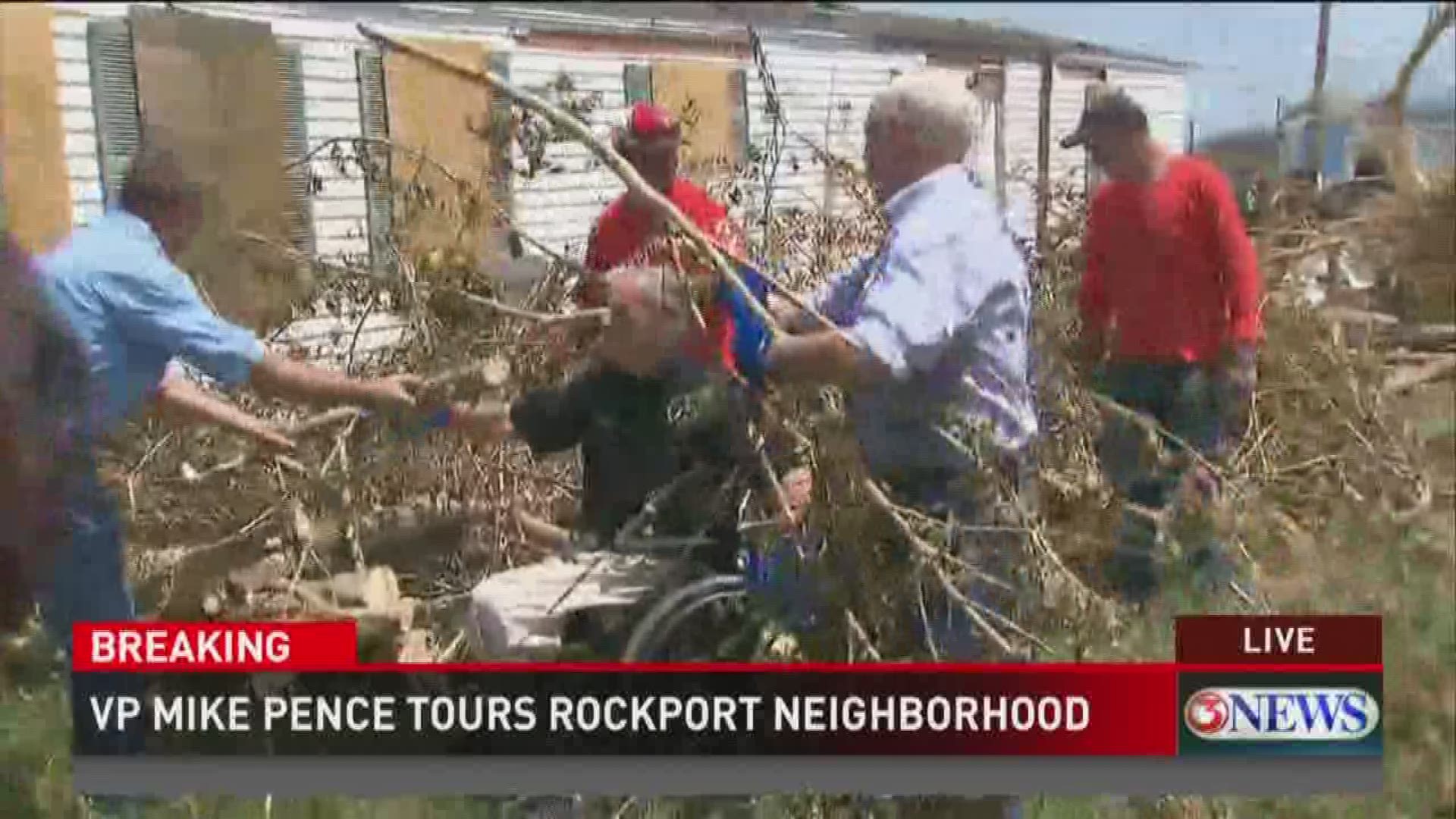 Vice President Mike Pence and Governor Greg Abbott both put on work gloves Thursday and helped clear debris in a Rockport neighborhood Thursday.