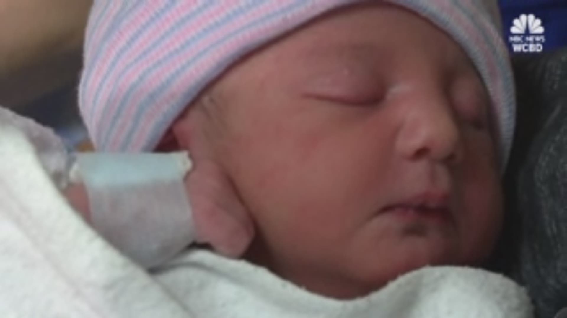 New Year's baby was born on the highway as parents were being chased by police for speeding.