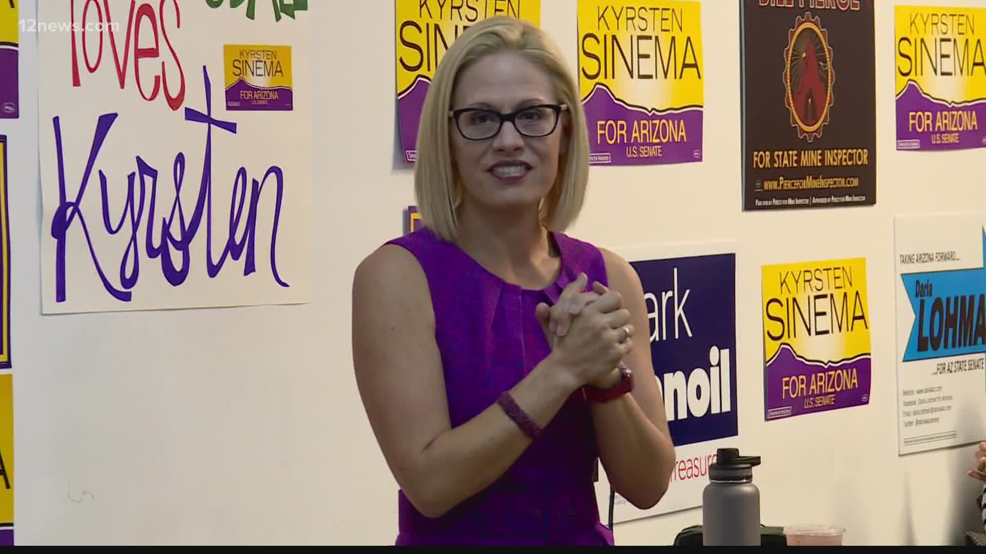 Senator Sinema is being hounded by critics who say she is standing in the way of President Biden's agenda. There are signs that the pressure is working.