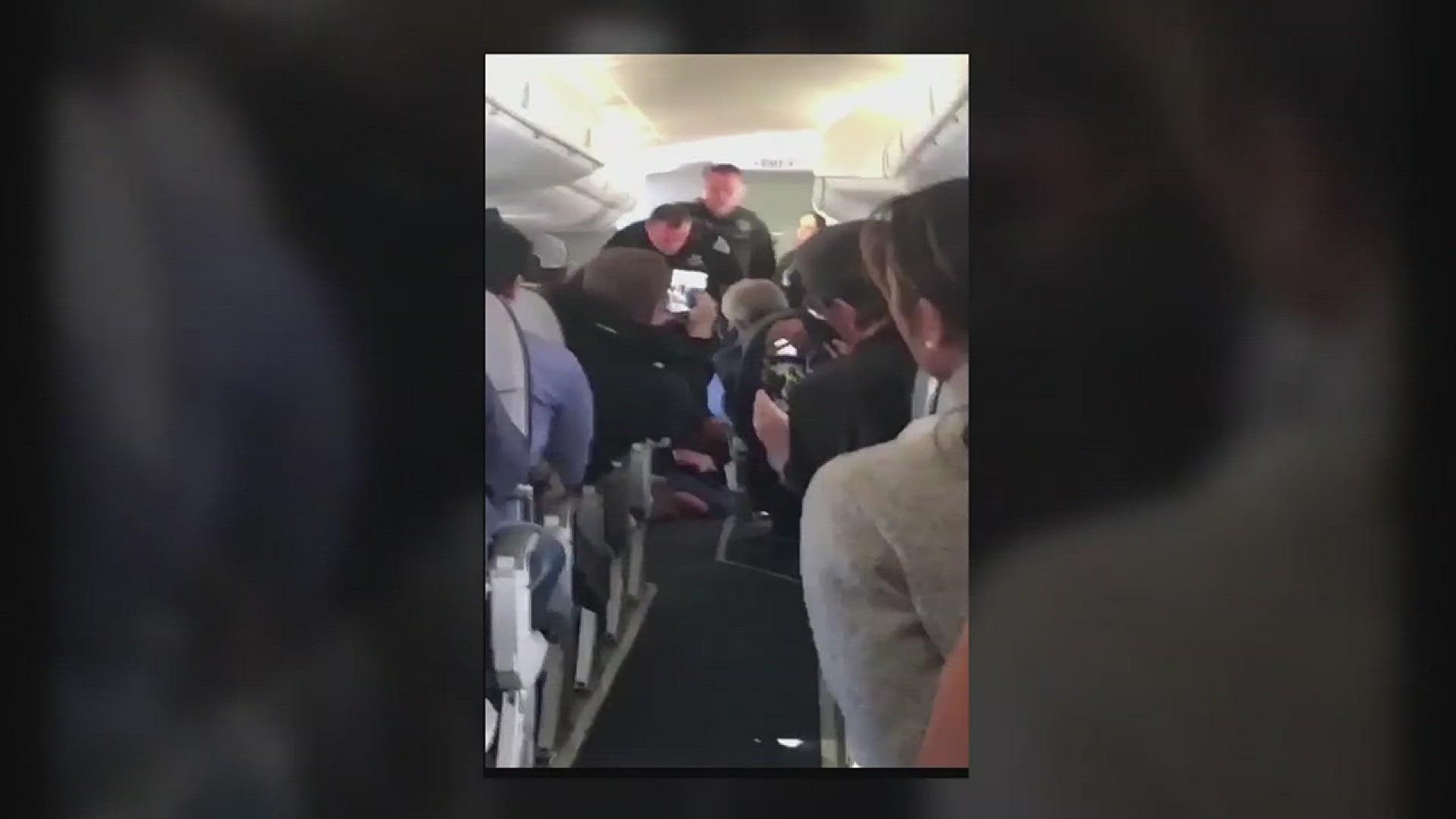Danny Torres of Meridian captured this video onboard SkyWest flight 5449 from San Francisco to Boise on Monday, when a woman was arrested after attempting to open a cabin door.