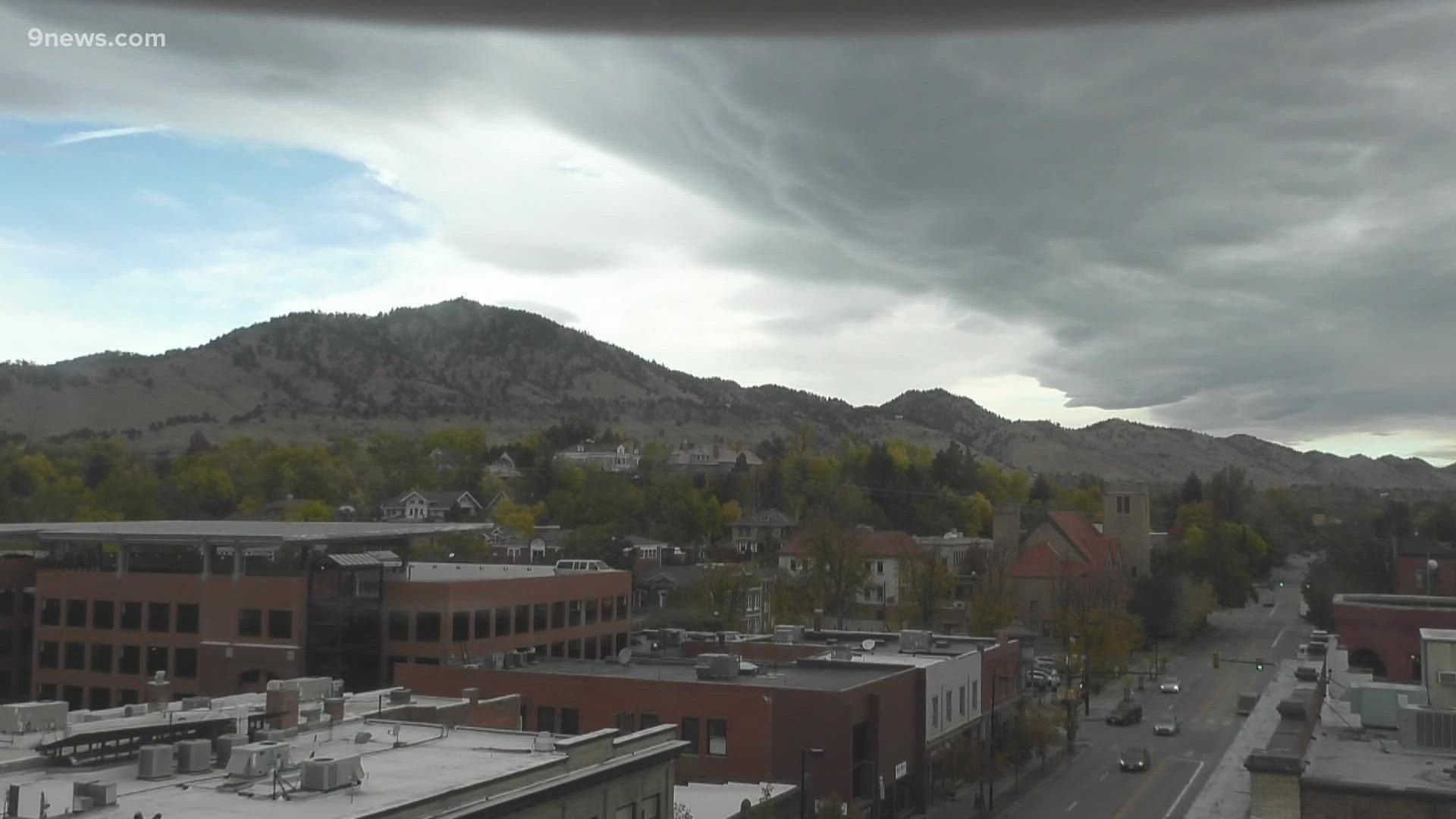 Back here in Denver we have been dealing with a stubborn "wave cloud" over the city & most of the front range today.