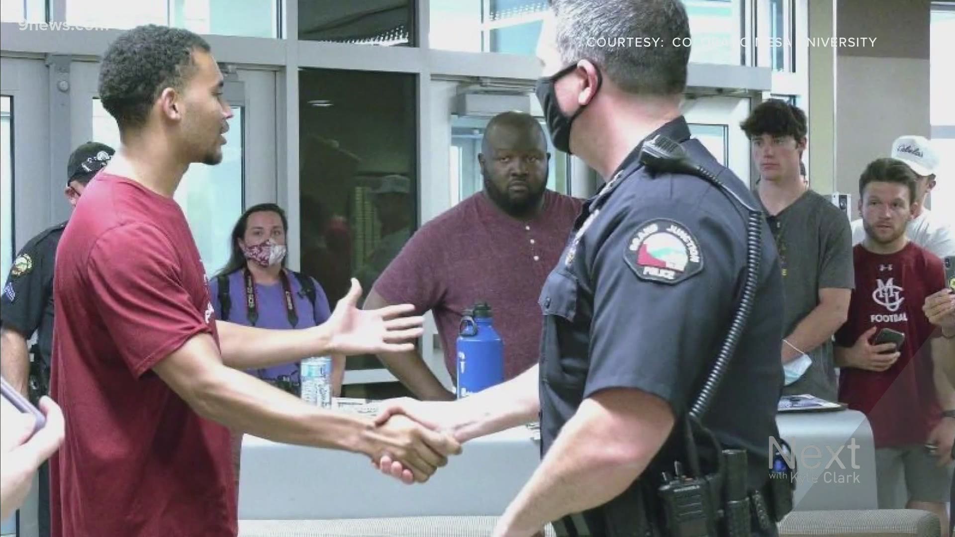 Colorado Mesa University's Tremaine Jackson protested with his team near the Grand Junction Police Dept. It ended with a discussion between players and police.