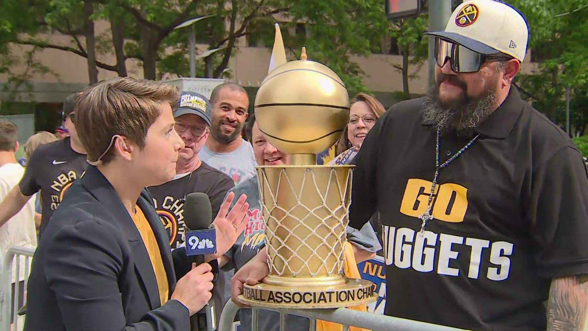 The crafty Denver Nuggets fan used items from thrift stores to make his own version of the Larry O'Brien trophy