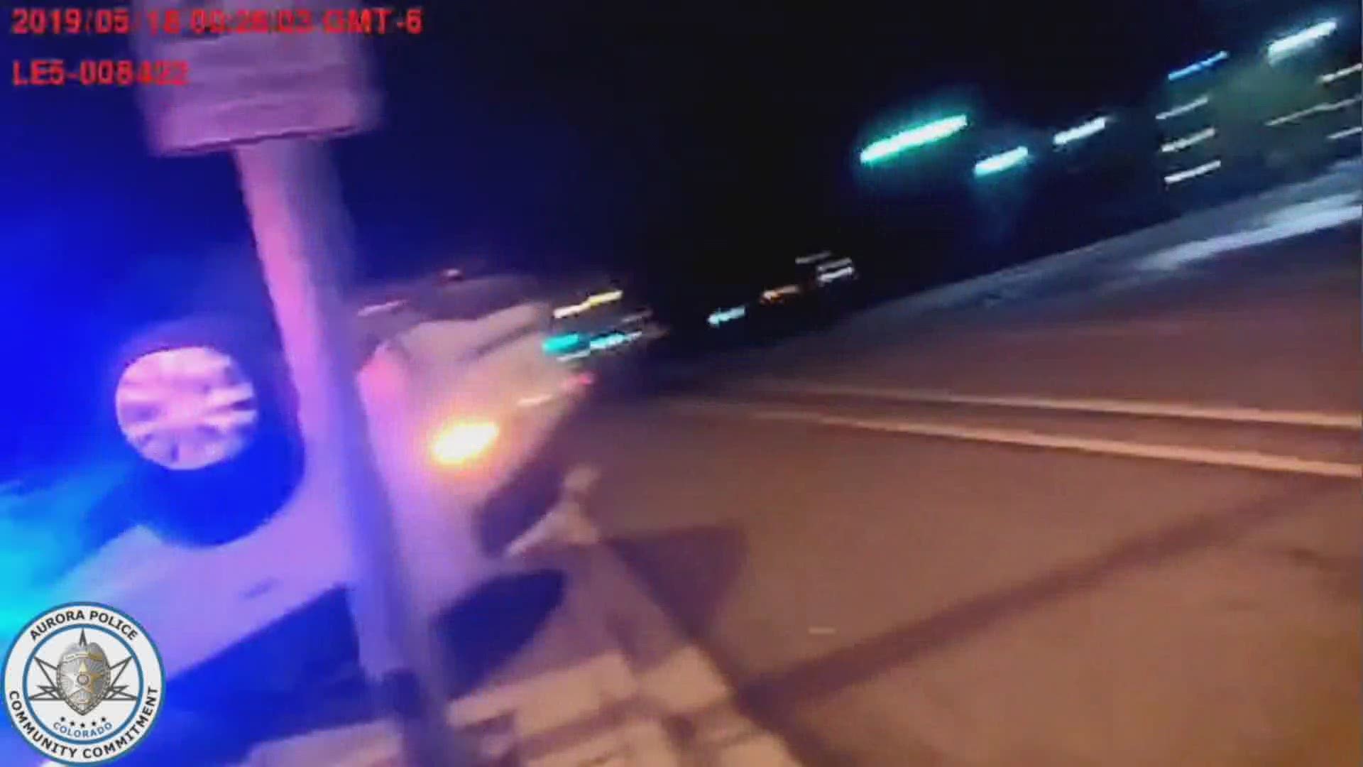 A body camera worn by an Aurora Police officer captured the moments after a car plowed into a patrol car last weekend near 38th and Chambers. ( video is silent)