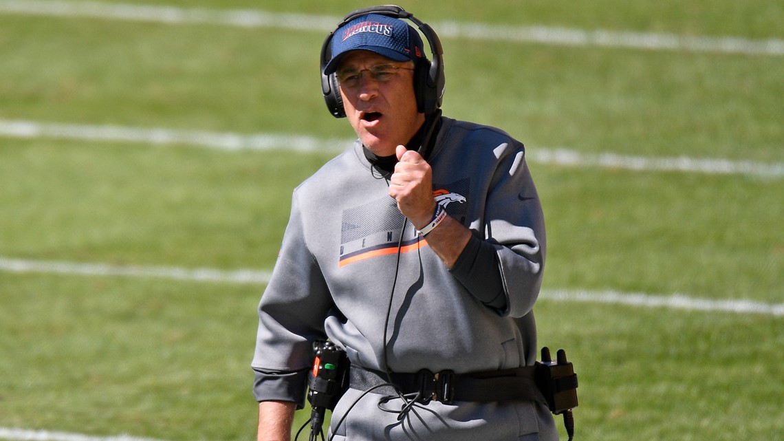 Head Coach Vic Fangio of the Denver Broncos wears an FDNY hat and