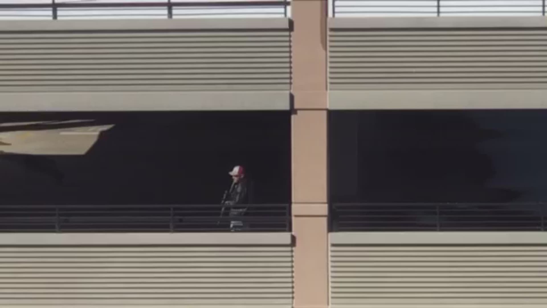 Denver Police said the man was arrested at a parking structure and no one was injured.