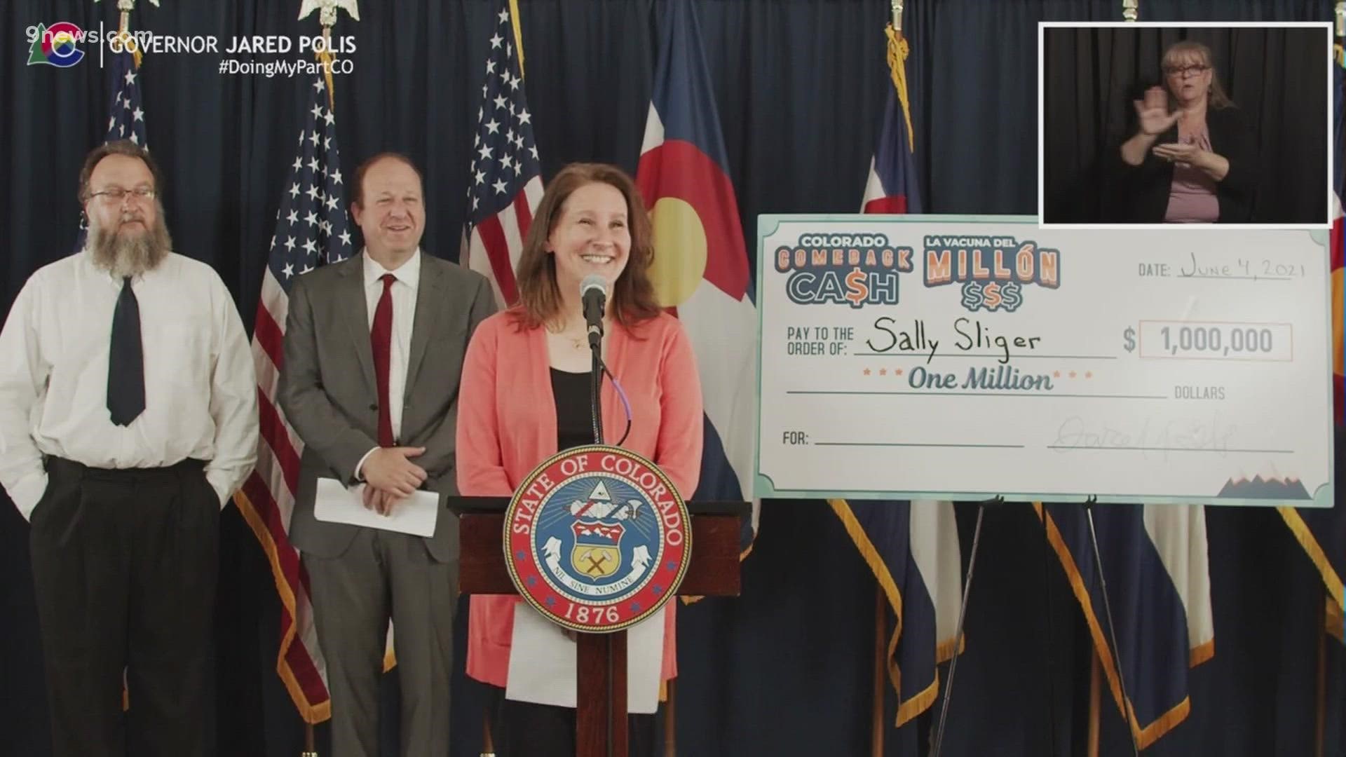 Gov. Jared Polis announced Sally Sliger as the first winner of Colorado's Comeback Cash COVID-19 vaccine drawing.