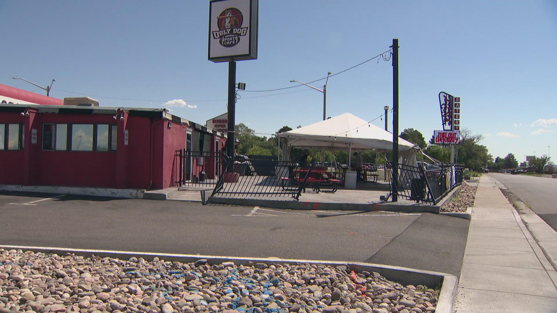 The driver was taken into custody after the crash at Ugly Dog Sports Cafe, and alcohol is believed to be a factor, the Adams County Sheriff's Office said.
