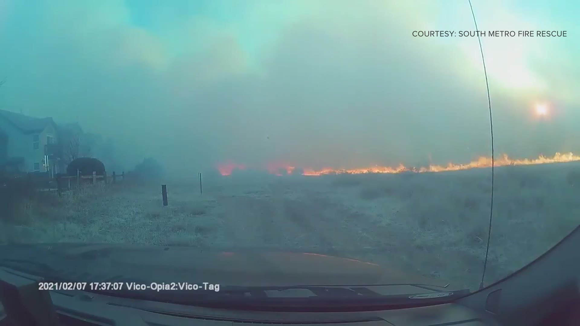 The South Metro Fire Department posted this video of the fire racing toward homes Sunday. Crews were able to control the fire and no homes were damaged.