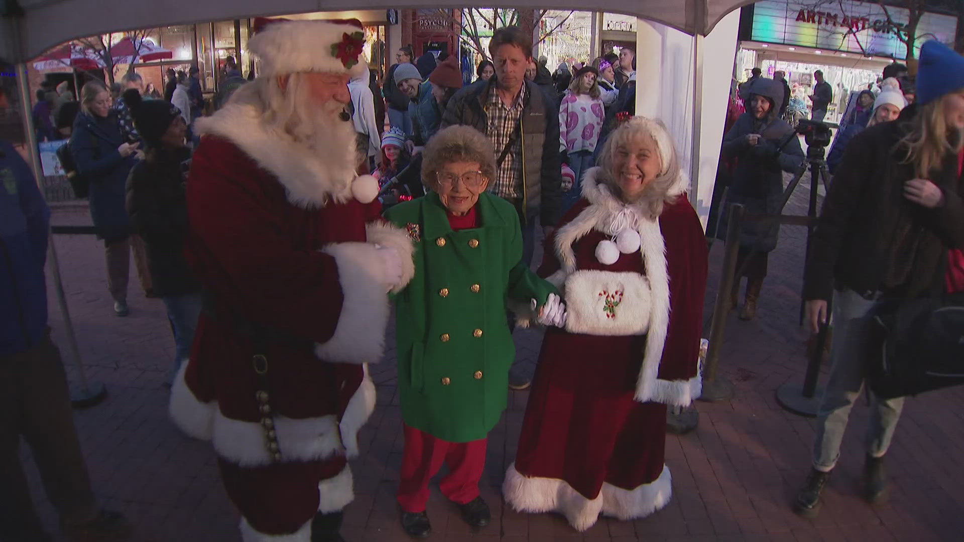 CU superfan Peggy Coppom flipped the switch to turn on all the light displays at the Pearl Street Mall on Sunday night.