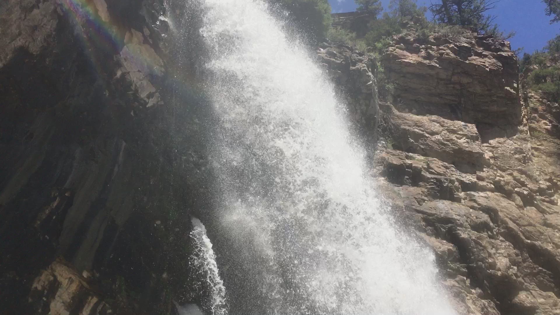 Spouting Rock flowing at full force right behind Hanging Lake in May of 2019