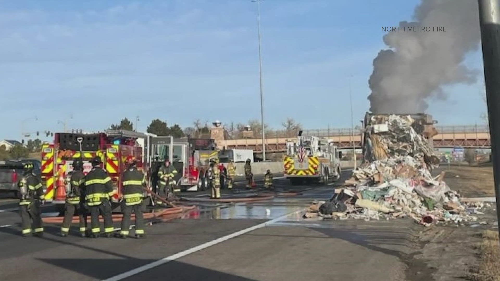 Several lanes of Interstate 25 were closed Monday morning while fire crews worked to put out a vehicle fire.