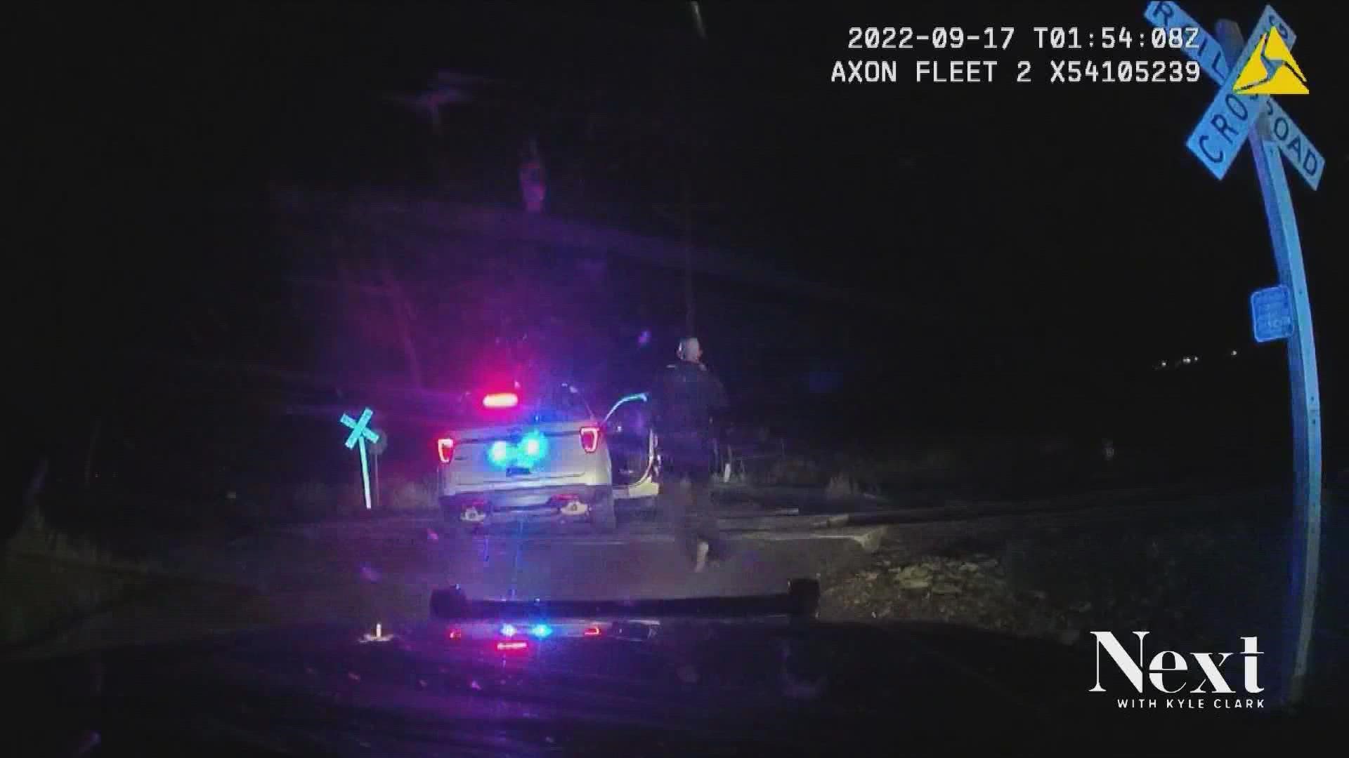 Officers left a patrol car parked on tracks last week with a suspect still inside, one they appear to have forgotten. That car was then hit by an oncoming train.