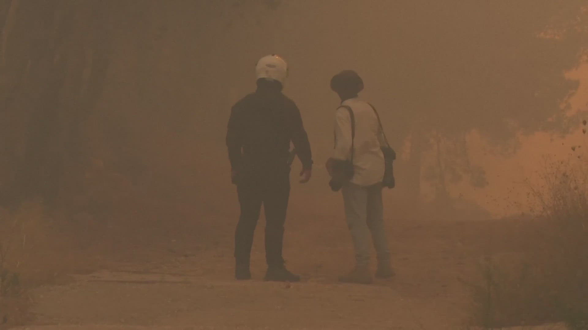 The fire that began Sunday afternoon in Greece burned homes and sent a blanket of smoke and ash over central Athens, where the smell of burning lingered in the air.