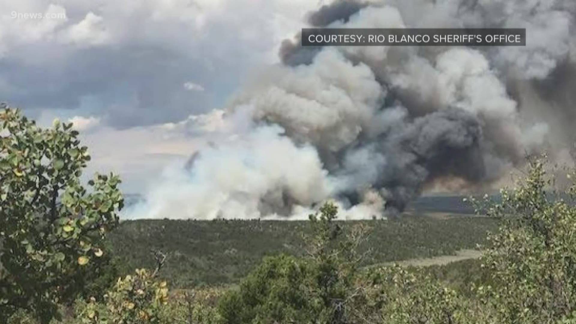 Firefighters are battling a 1,000-acre fire burning about 26 miles southwest of Meeker in Rio Blanco County.
