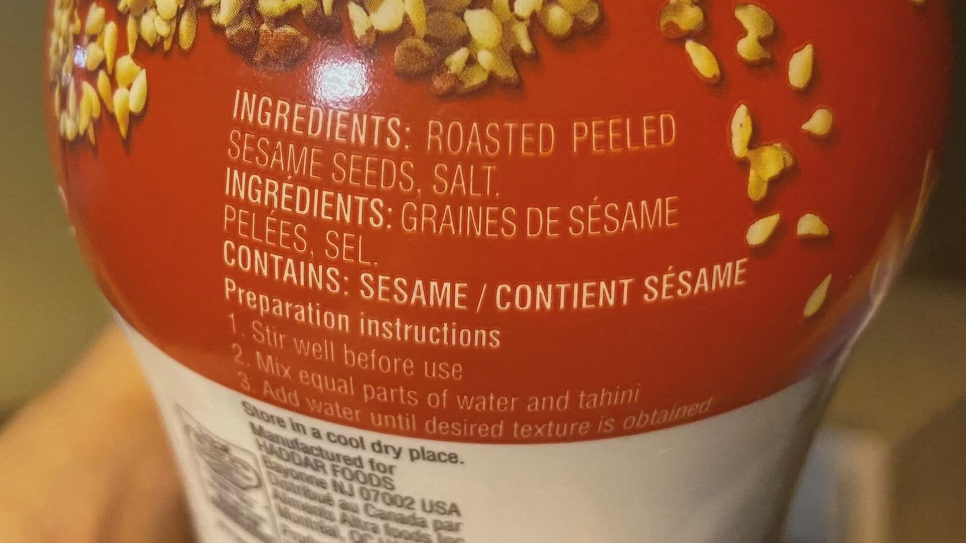 A new federal law now requires an allergen label for sesame in food products. Patients say companies are sidestepping the law's intended effect.