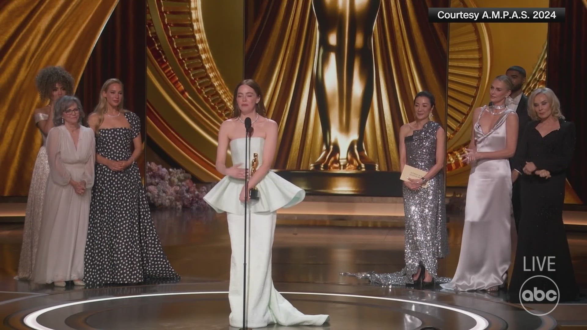 A stunned Emma Stone won the best actress Oscar for “Poor Things,” her second career victory in the category.