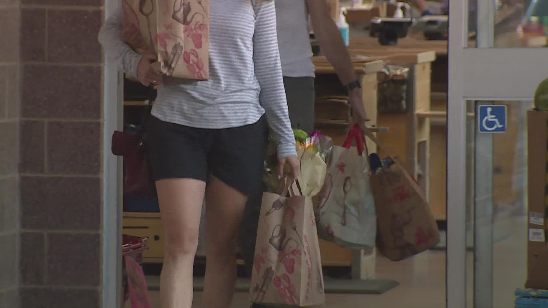A city ordinance going into effect May 1 bans plastic bags at grocers larger than 10,000 square feet. Paper bags will be available for 10 cents each.