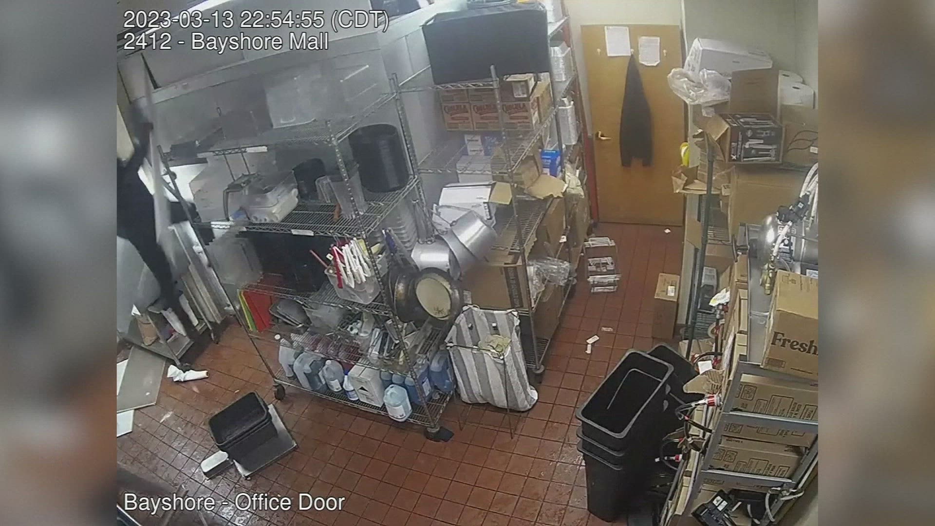 Two suspects were arrested in an attempted armed robbery of a Qdoba restaurant in Glendale, Wisconsin. Surveillance video shows them falling through the ceiling.