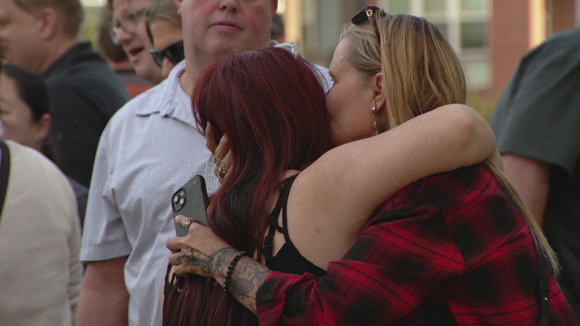 Community gathers to remember 3 family members killed in apparent ...
