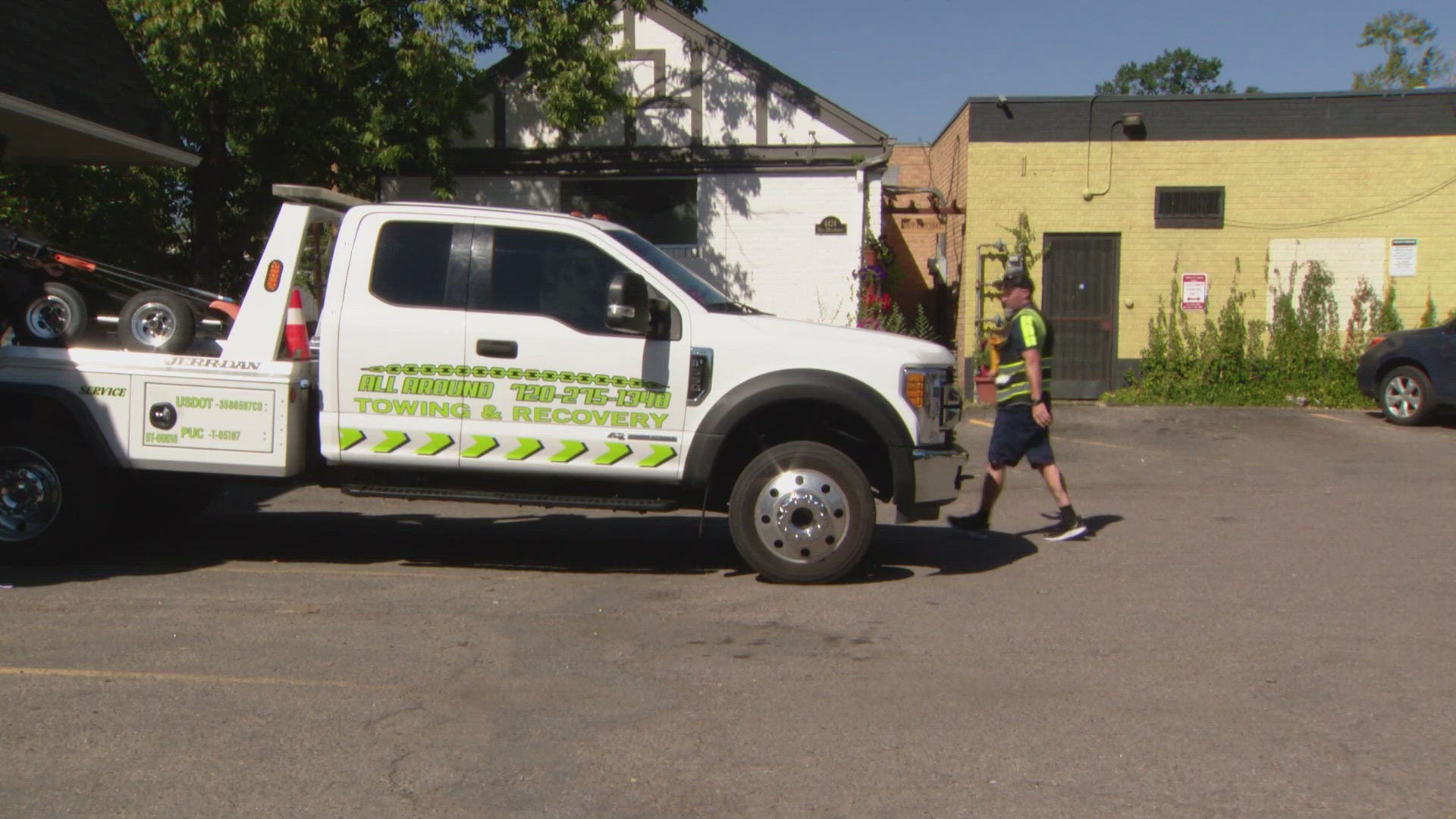 The owner of the café at 29th and Tennyson in Denver said she pays for the full lot and needs the space for her customers.