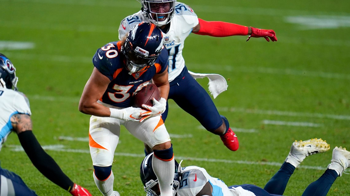 November 03, 2019: Denver Broncos running back Phillip Lindsay (30) is  congratulated during a timeout after his 16-yard sealed the win at the end  of the second half of the game between