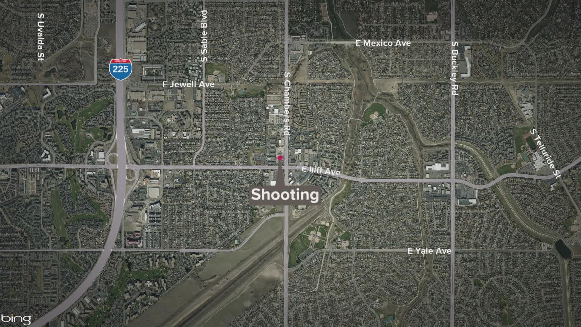 Aurora Police are searching for an unidentified suspect who shot 2 men in a parking lot.