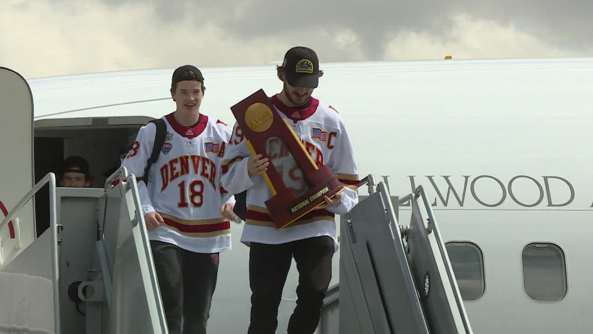 The Pioneers flew back to Denver on Sunday after winning the NCAA hockey national championship game in Boston the night prior.