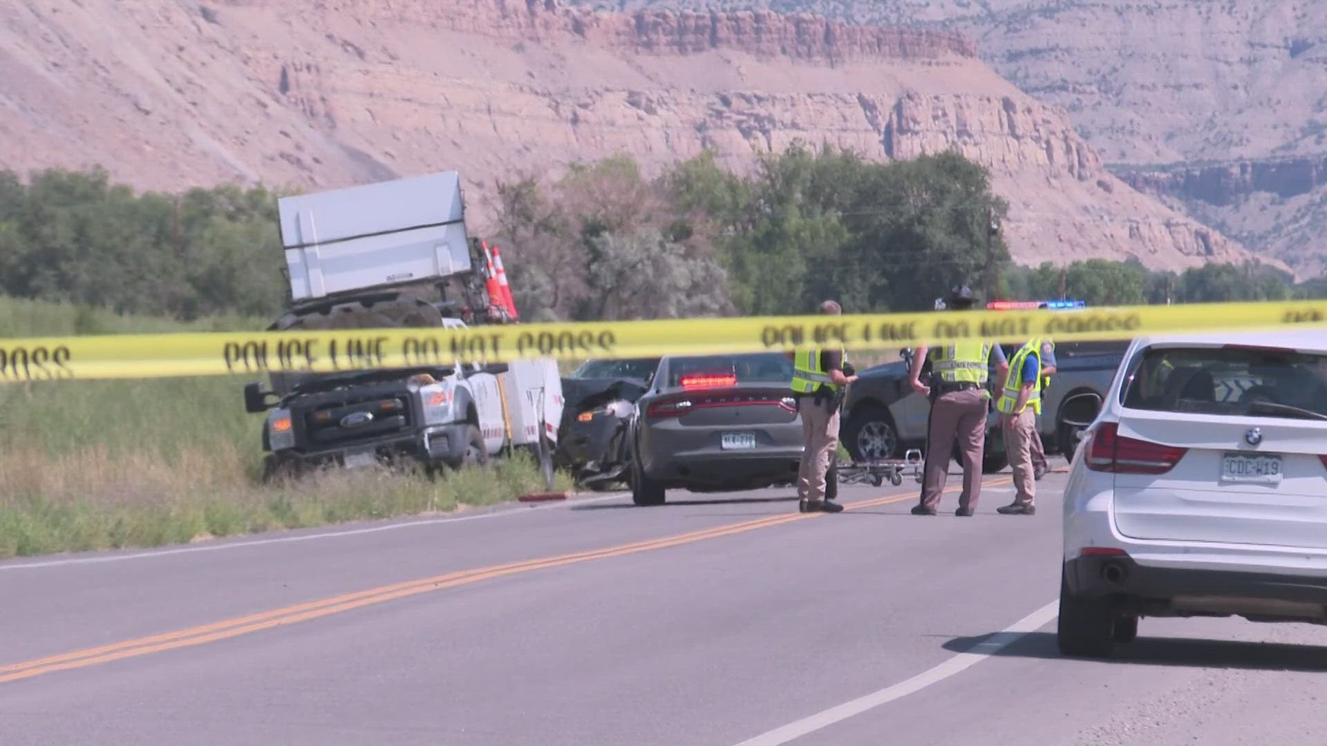 Troopers said the driver of a Jeep Grand Cherokee hit two CDOT workers who were working outside of their vehicle.