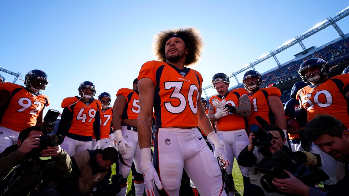 Denver Broncos running back Phillip Lindsay (30) takes part in drills  during the opening day of the team's NFL football training camp Thursday,  July 18, 2019, in Englewood, Colo. (AP Photo/David Zalubowski