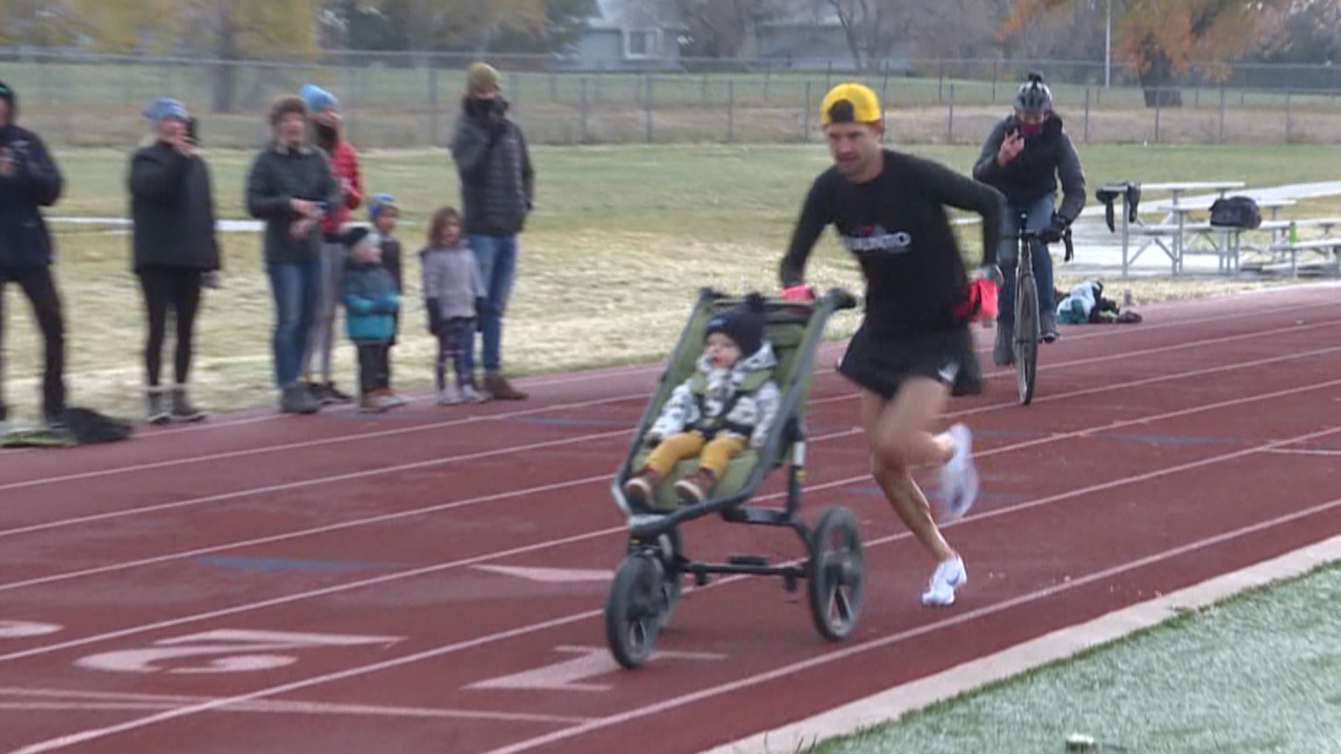 Andrew Vos clocked a 4:57:1 mile while pushing his 1-year-old son in a stroller.