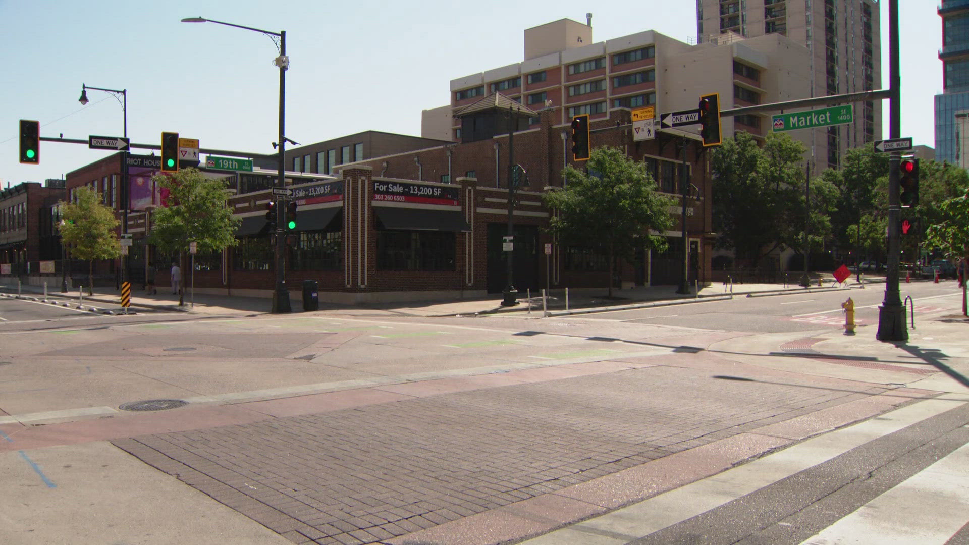 A man was taken to the hospital after he was shot by an officer in downtown Denver Saturday morning, police said.