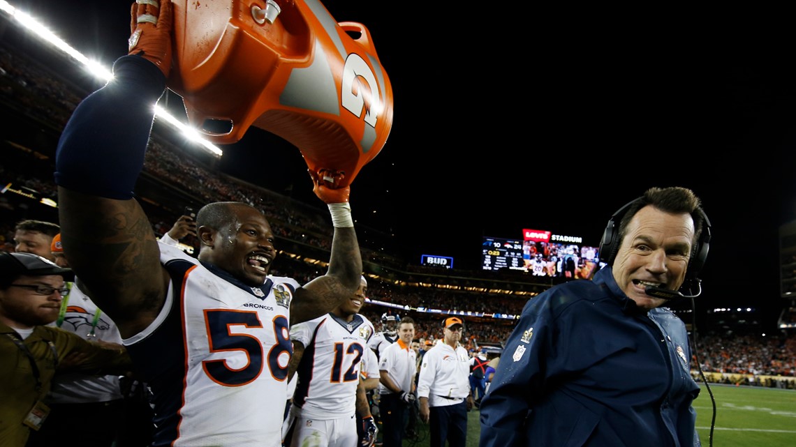 Photo: Denver Broncos Head Coach Gary Kubiak holds the Lombardi Trophy -  SBP20160207097 