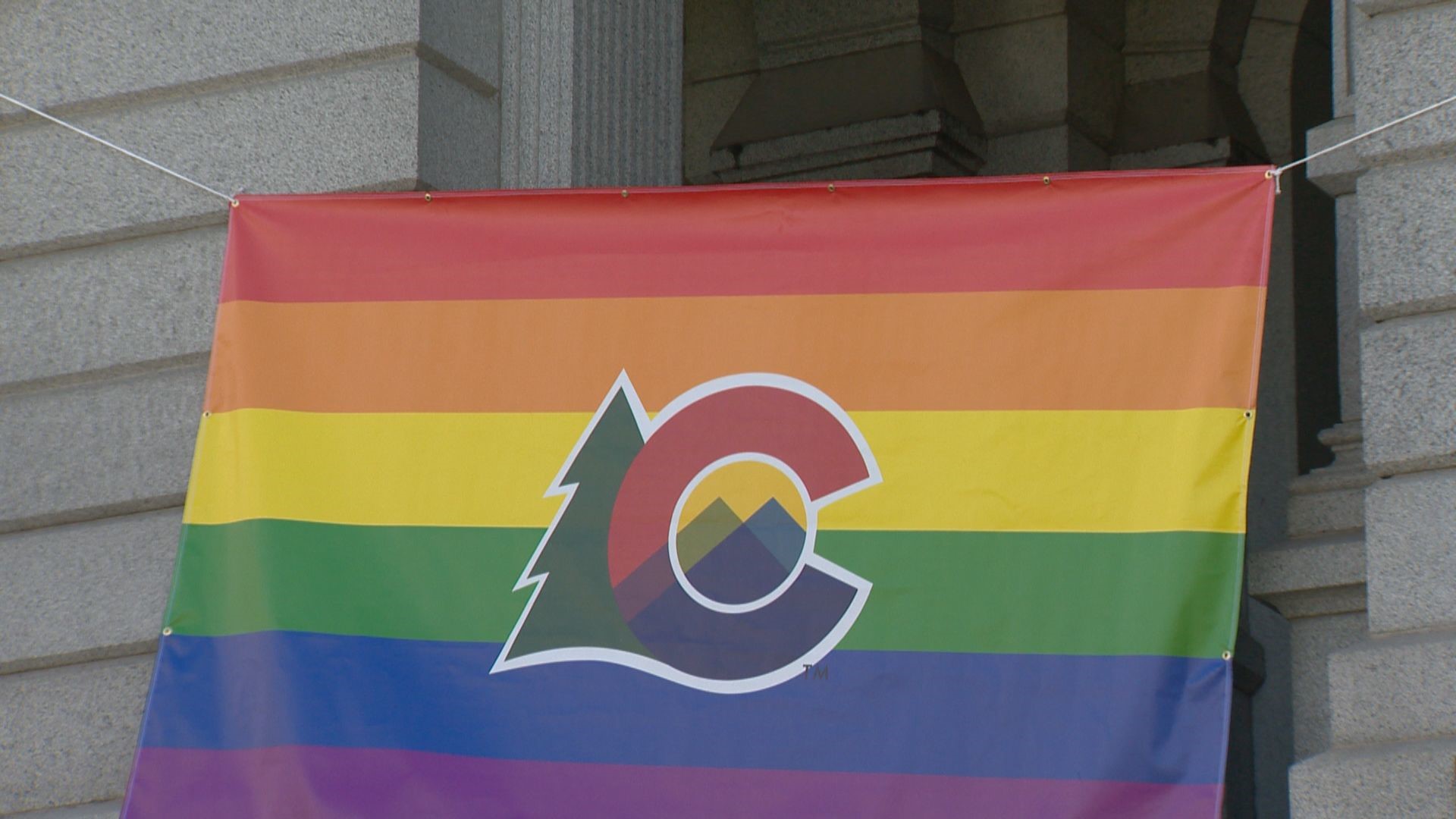 Jared Polis, Colorado's first gay governor, flies Pride flag outside
