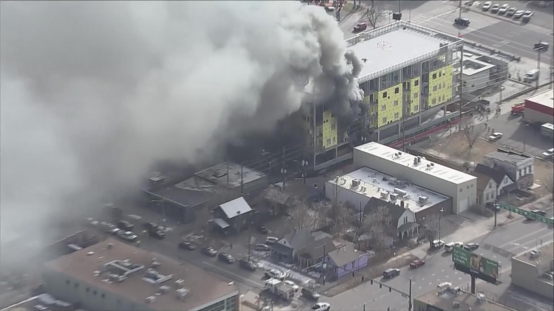 A construction worker was taken to Denver Health to be treated for smoke inhalation following the fire near 6th Ave. and Santa Fe Drive, according to Denver Fire.