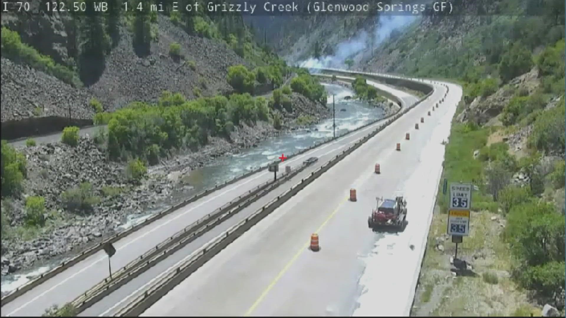 Flames were seen burning near the westbound lanes of Interstate 70.