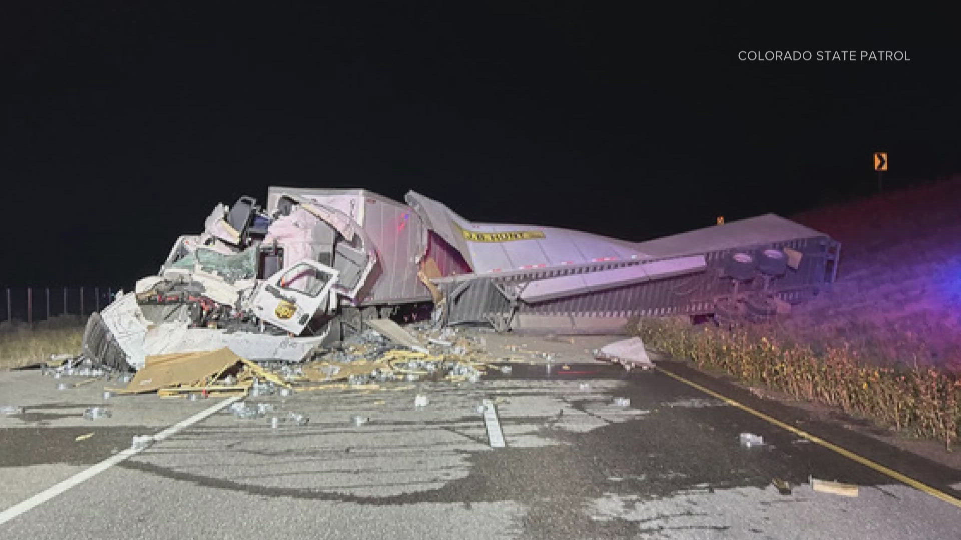 One truck was going west when the driver went through the left shoulder barrier and into the eastbound lanes, where it collided with a semi truck going east.