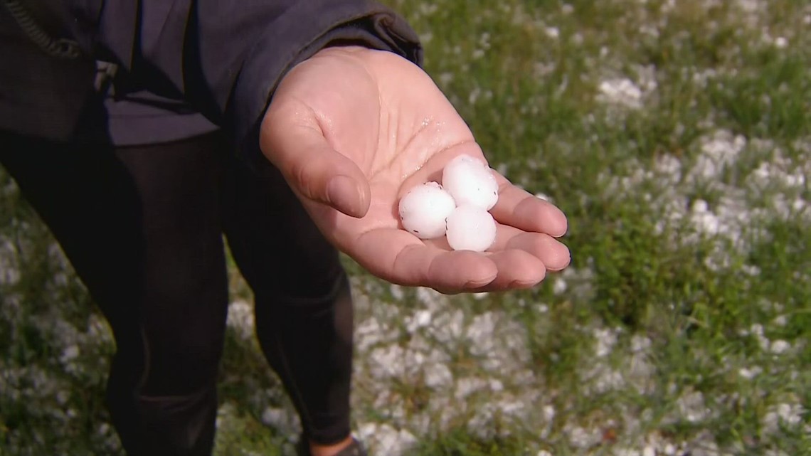 Quartersized hail blankets ground in Edgewater