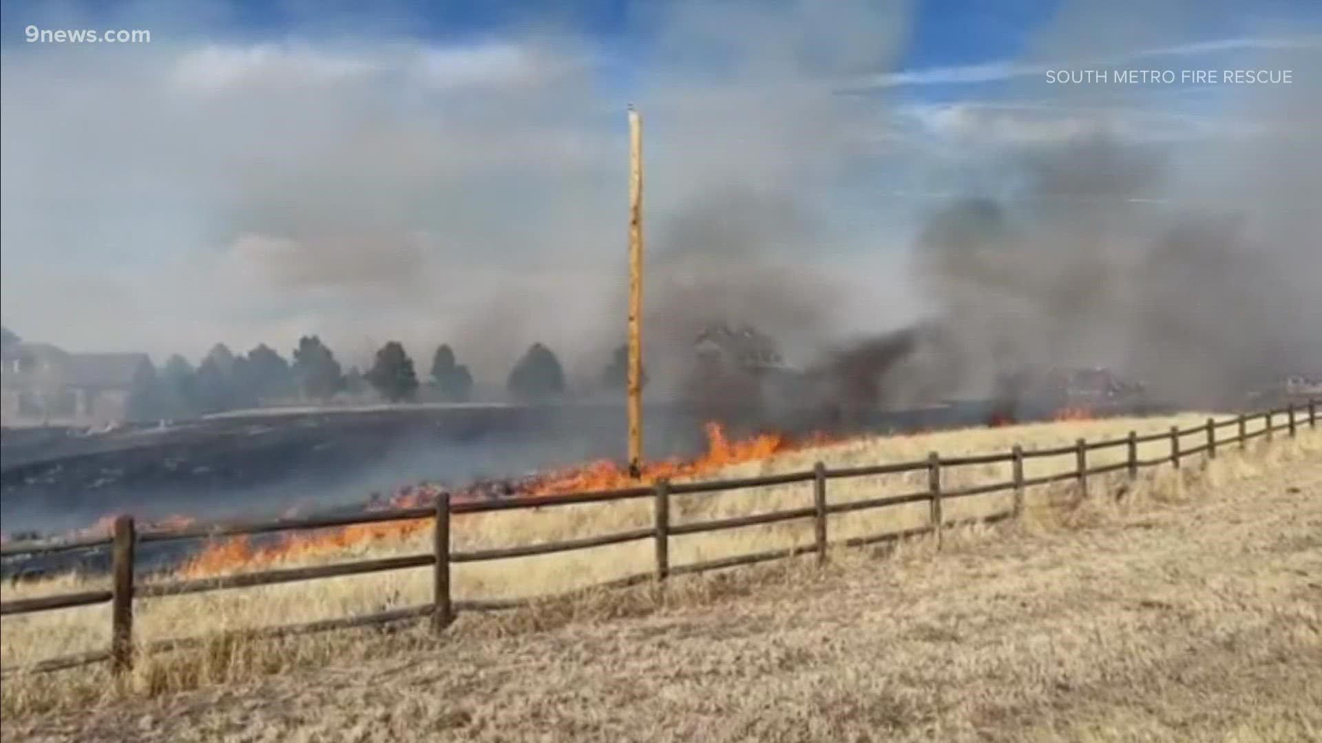 A wildfire on the east side of U.S. 85 in Douglas County is now 100 percent contained. The cause of the blaze is under investigation.