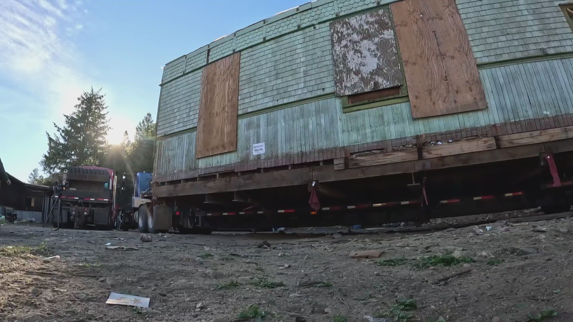 A 121-year-old train depot was moved through Colorado's mountains to a new home at the Moffat Road Railroad Museum in Granby this week.
