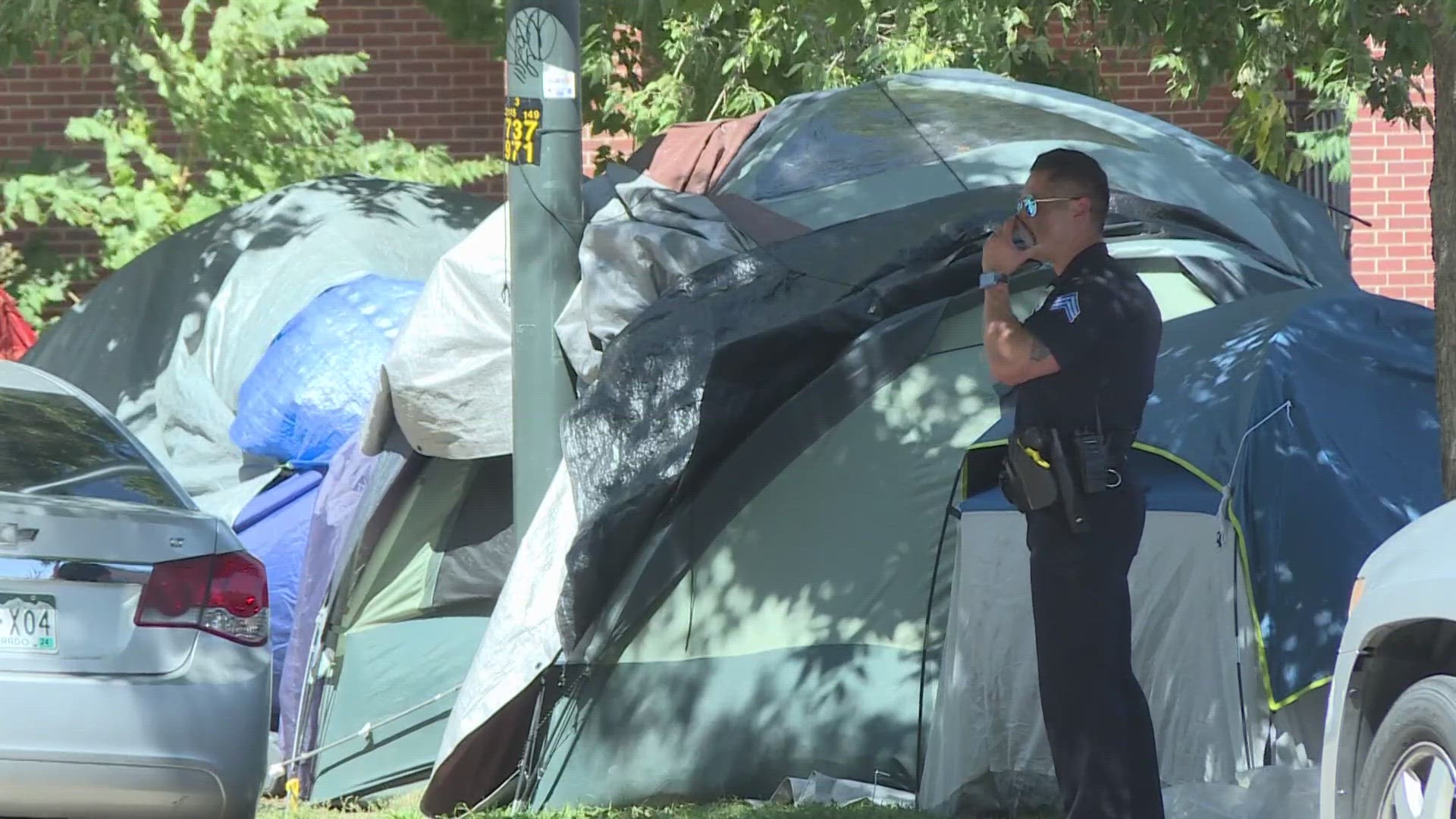 The city is clearing out an encampment in the area of 17th Avenue and Logan Street, where two people were staying when they were shot Monday.